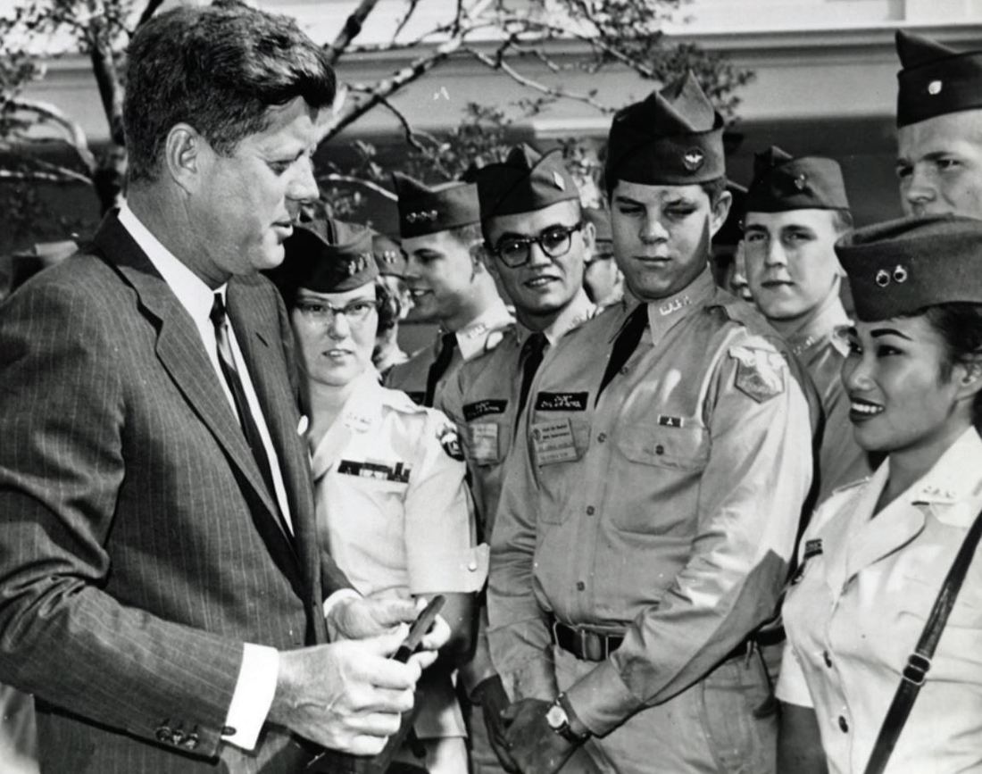 President John F. Kennedy speaking with uniformed Civil Air Patrol cadets.